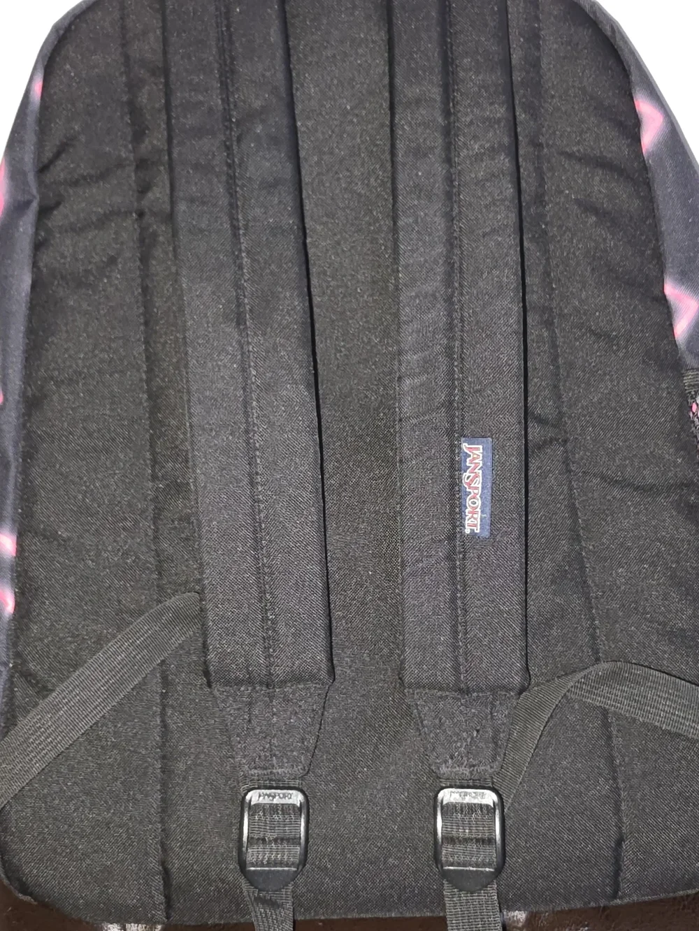 Jansport Black Backpack with Neon Pink Heart Pattern